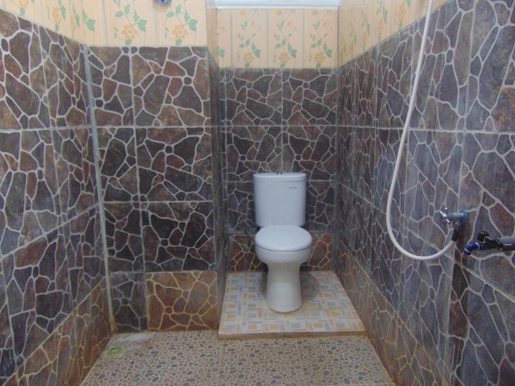 Santigi Homestay Гили Еър Екстериор снимка